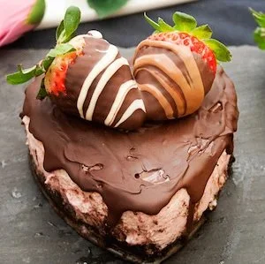 Delicious Chocolate Covered Strawberry Cake with fresh strawberries on top