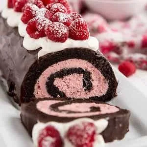 Delicious Chocolate Raspberry Mousse Cake with layers of chocolate and raspberries