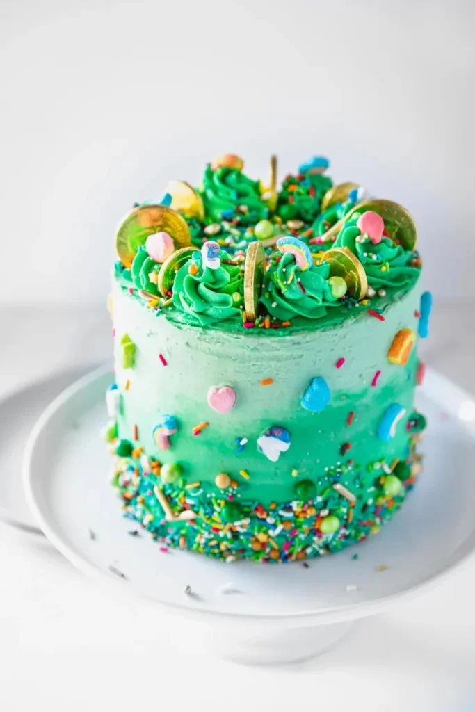 Lucky Charms Sprinkle Cake with colorful marshmallows and frosting
