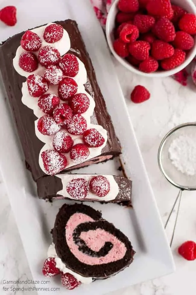 Delicious Raspberry Chocolate Swiss Roll dessert with fresh raspberries and chocolate