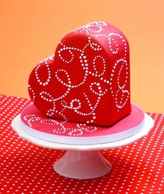 Beautiful Valentine's Day cake decorated with heart-shaped accents.