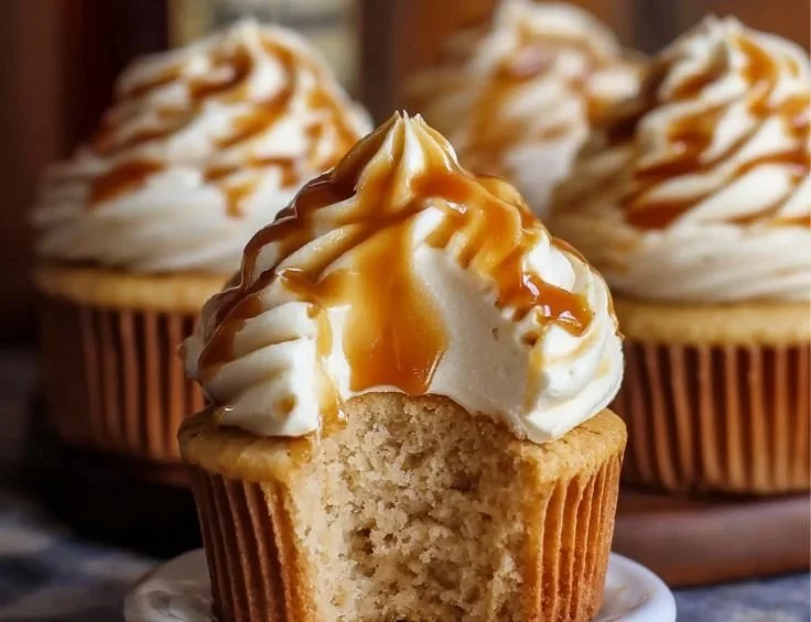 Delicious Harry Potter Butterbeer Cupcakes topped with caramel frosting