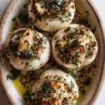 Deliciously prepared stuffed turnips on a rustic plate.