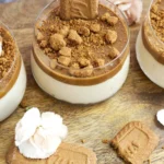 Delicious 2-ingredient Biscoff mousse served in a glass topped with cookie crumbs.