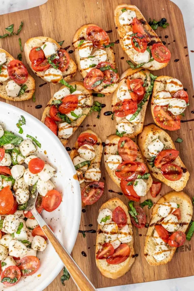 Fresh Caprese Bruschetta topped with tomatoes, mozzarella, and basil on toasted bread