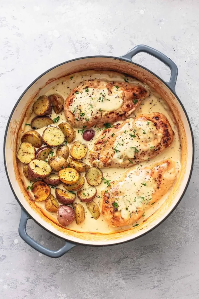 Chicken and Potatoes with Dijon Cream Sauce served on a plate