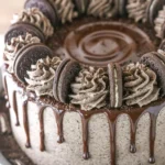 Delicious Chocolate Oreo Cake with a rich chocolate frosting and Oreo cookie toppings