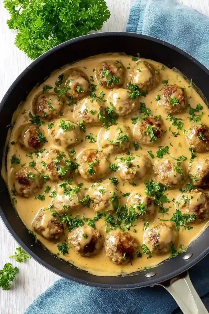 Delicious creamy Swedish meatballs served in rich brown sauce