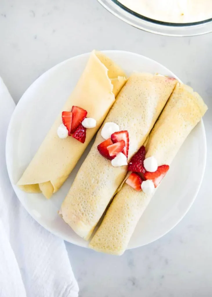 Homemade crepe recipe with various filling options for sweet or savory crepes