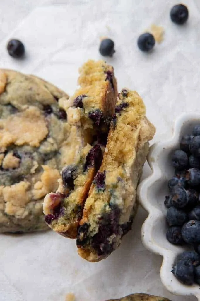 Close-up of Crumbl blueberry muffin cookies with streusel topping