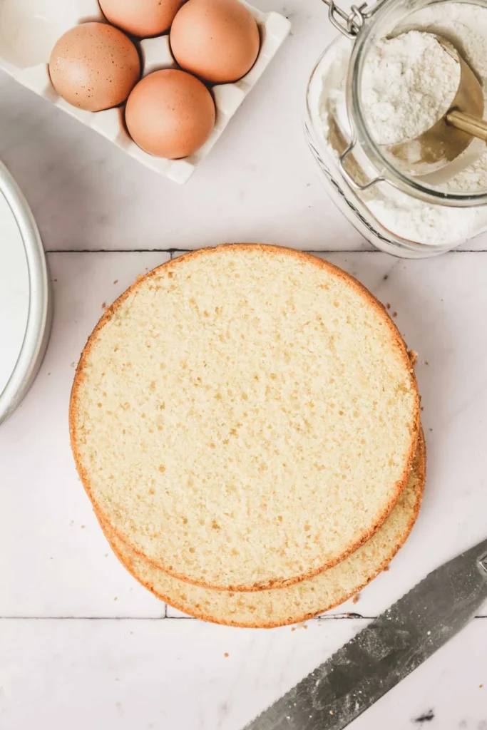 delicious slice of easy vanilla sponge cake on a plate