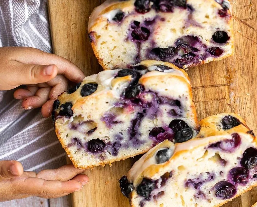 Freshly baked lemon blueberry bread with vibrant blueberries and a hint of lemon zest
