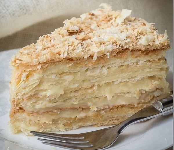 Delicious Russian Napoleon Cake with layers of cream and flaky pastry
