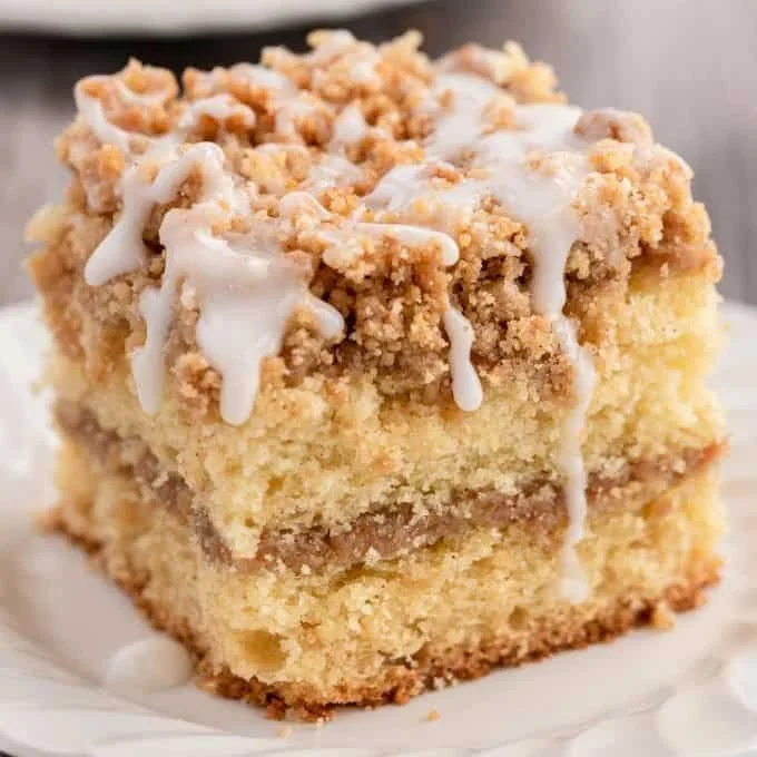 Delicious slice of sour cream coffee cake with a rich crumb topping
