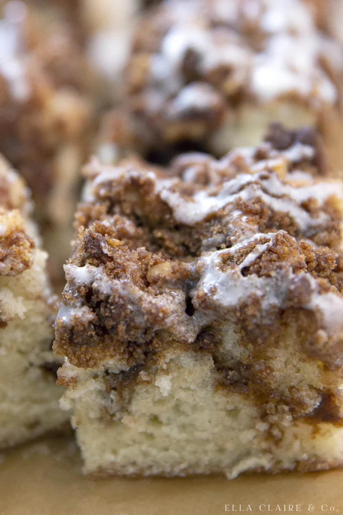 Delicious homemade coffee cake with a crumbly topping and coffee cup