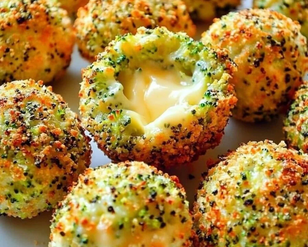 Baked broccoli cheese balls served on a plate, crispy and golden brown.