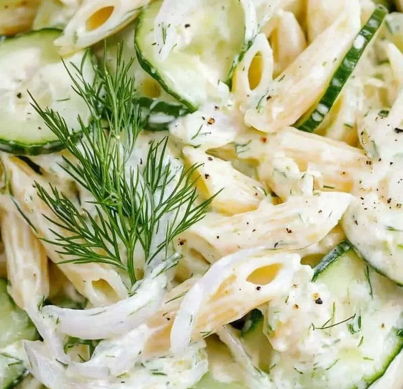 Delicious cucumber pasta salad with fresh vegetables and dressing