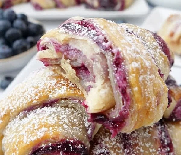 Blueberry Cream Cheese Puff Pastry topped with fresh blueberries and powdered sugar