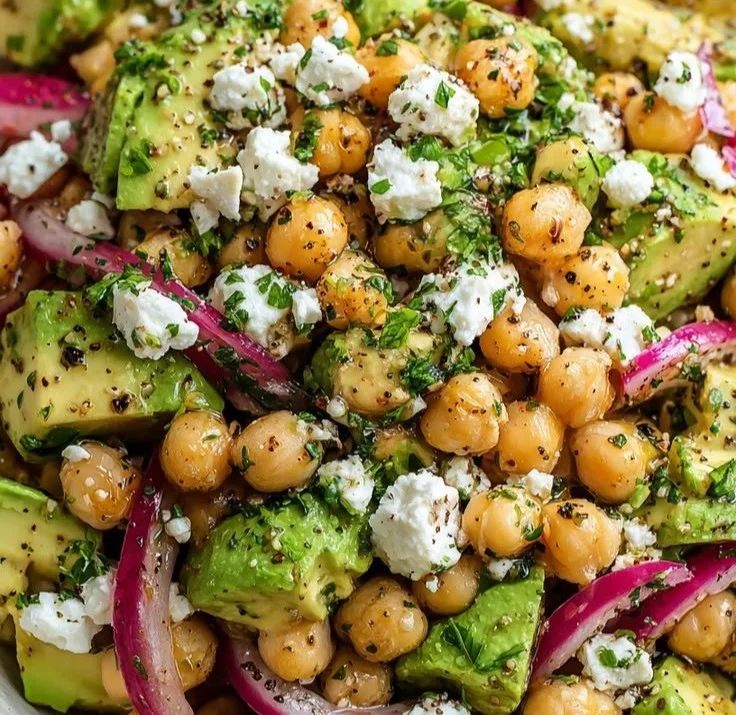 Chickpea Feta Avocado Salad served in a bowl with fresh ingredients