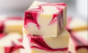 Creamy white chocolate raspberry fudge with swirls of raspberry