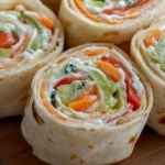 Fresh vegetable tortilla roll-ups with vibrant vegetables wrapped in tortillas