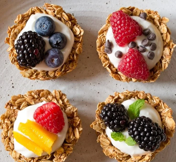 Healthy breakfast granola cups filled with nuts and fruits