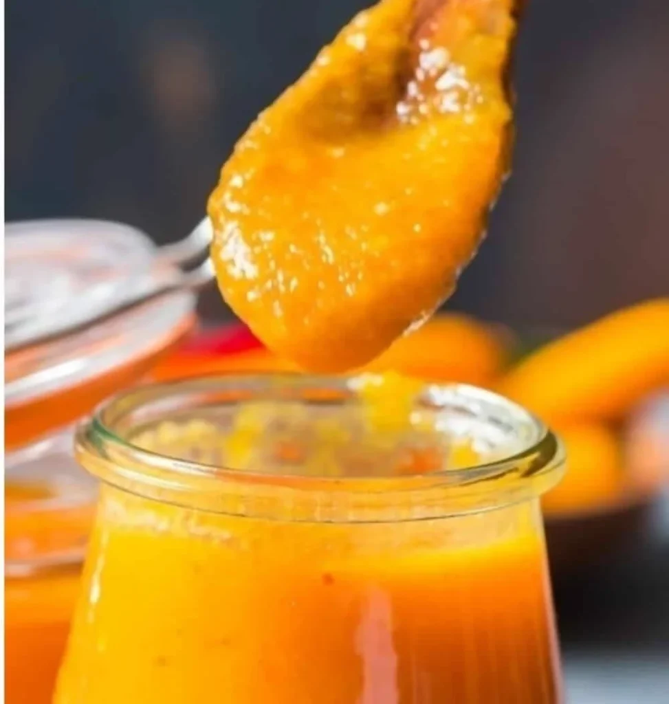 Bottle of Mango Habanero hot sauce with vibrant label and tropical ingredients.