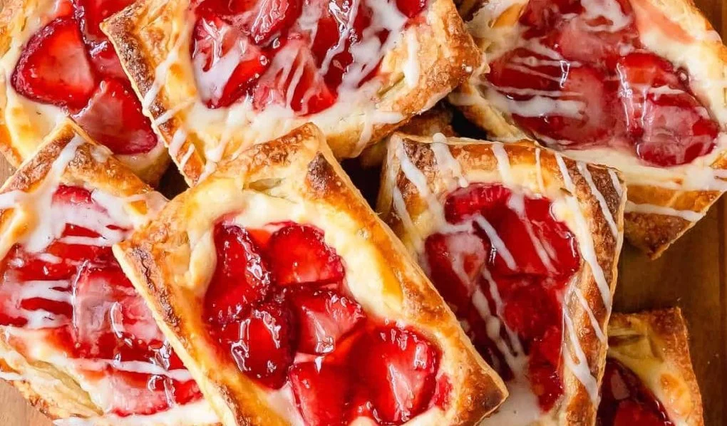 Homemade Strawberry Danish pastry with fresh strawberries and icing