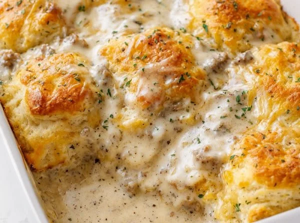 Delicious casserole dish featuring biscuits and gravy, perfect for a hearty meal.