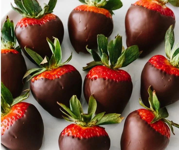 Delicious chocolate-dipped strawberries arranged on a plate
