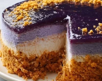 Delicious creamy ube cheesecake topped with purple yam.