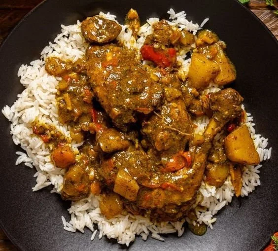 Genuine Jamaican Curry Chicken recipe with vibrant spices and tender chicken.