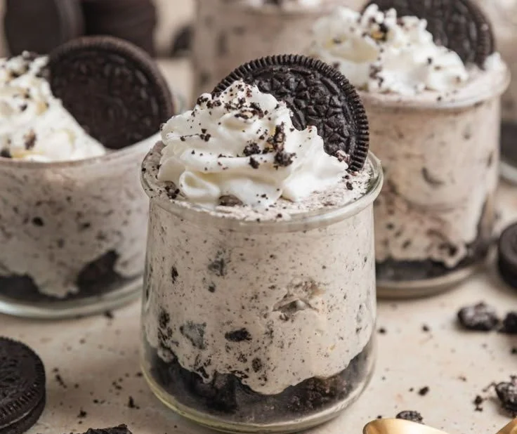 Delicious no-bake Oreo cheesecake cups topped with crushed Oreos