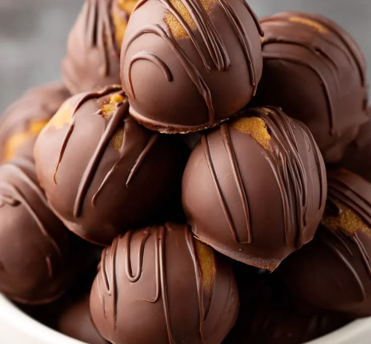 Delicious homemade peanut butter balls ready to enjoy as a snack or dessert.