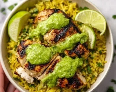 Deliciously roasted Peruvian chicken served with rice and spices.