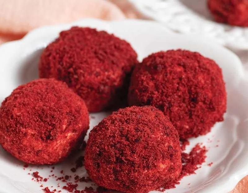 Delicious Red Velvet Cheesecake Bites on a white plate