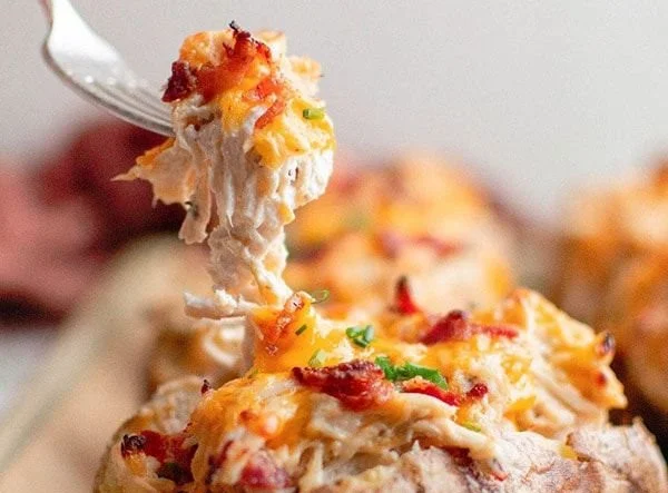 Delicious stuffed potatoes filled with crack chicken topping