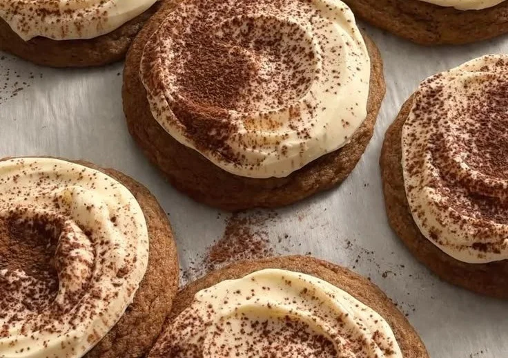 Delicious homemade tiramisu cookies on a plate with coffee beans