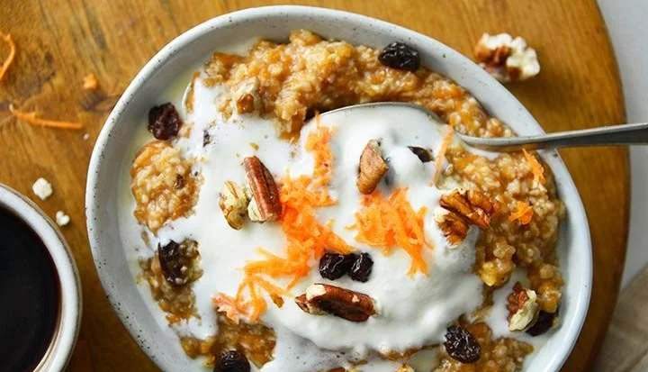 Healthy carrot cake oatmeal breakfast recipe featuring oats and carrots.