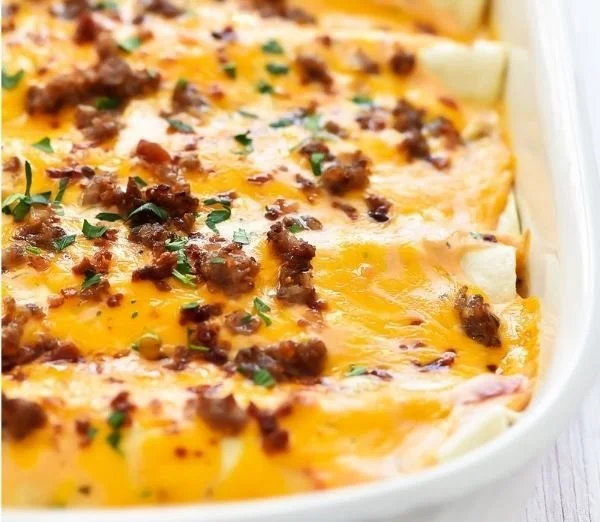 Delicious breakfast enchiladas topped with fresh ingredients