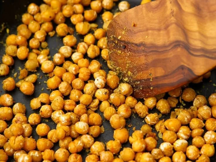 Delicious sautéed chickpeas seasoned and served as a nutritious dish