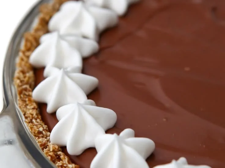 Decadent Vegan Chocolate Pie served on a wooden table