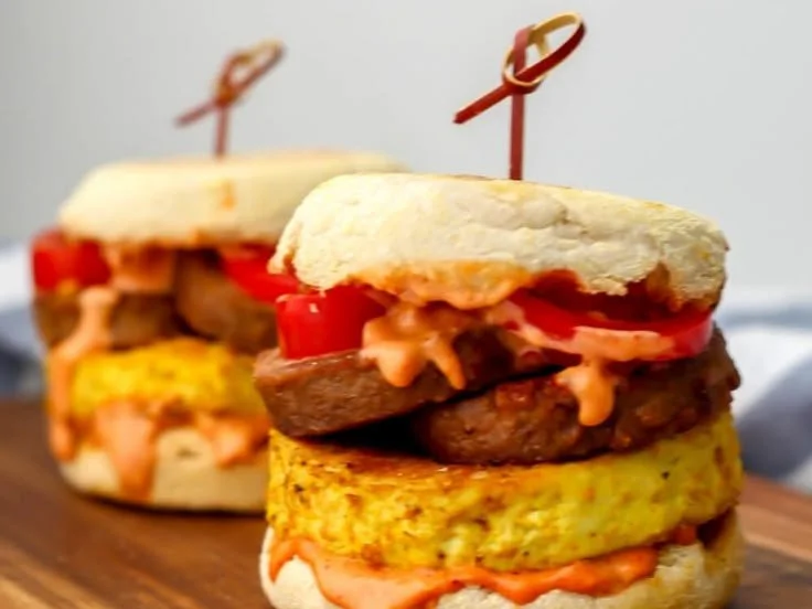 Delicious vegan tofu breakfast sandwich served on a plate