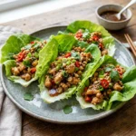 Delicious Asian chicken lettuce wraps served on a plate